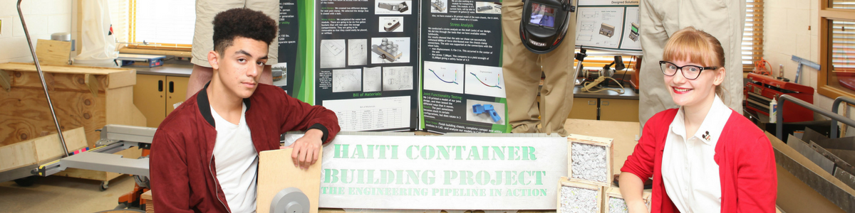 Engineering Students with display about Haiti Container Building Project Engineering Students with display about Haiti Container Building Project